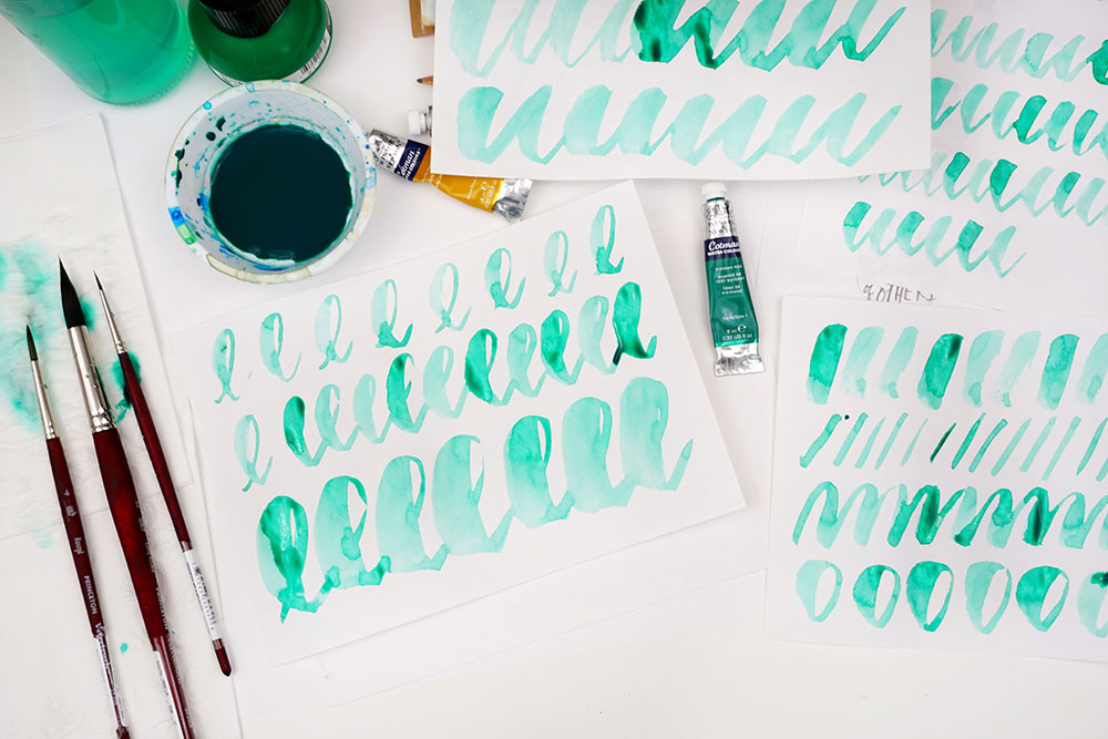 Words bring us together: brush lettering using watercolor and ink